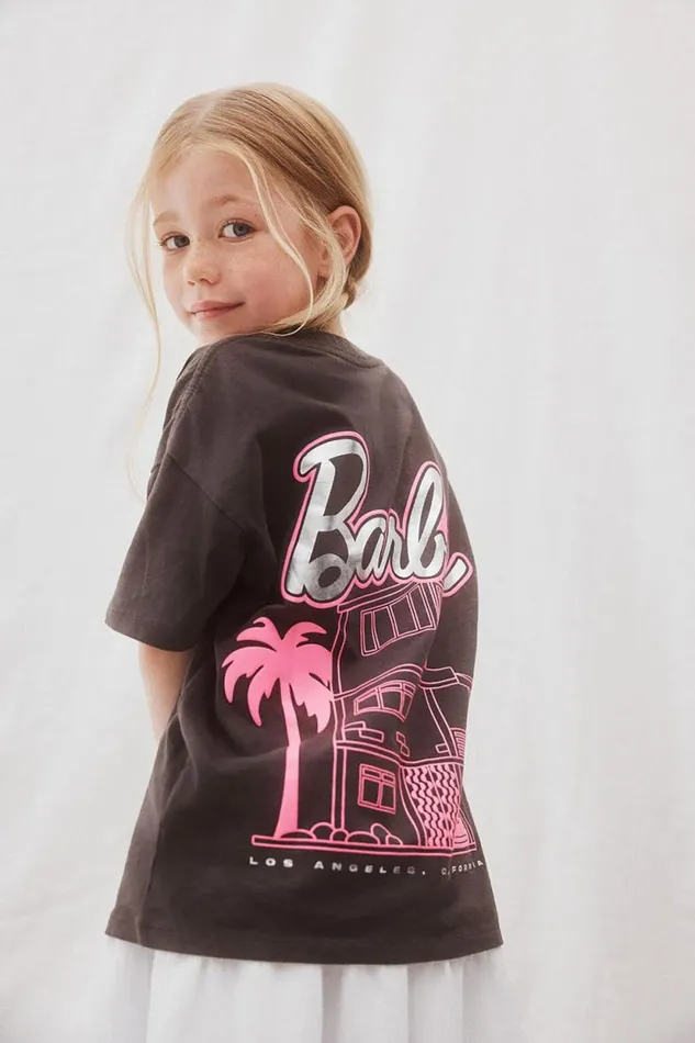 License Drop Shoulder Short Sleeve Tee Lcn Mat Barbie Dream Housephantom Girls Cotton On Tops and TShirts License Drop Shoulder Short Sleeve Tee Lcn Mat Barbie Dream Housephantom Girls Cotton On Tops and TShirts
