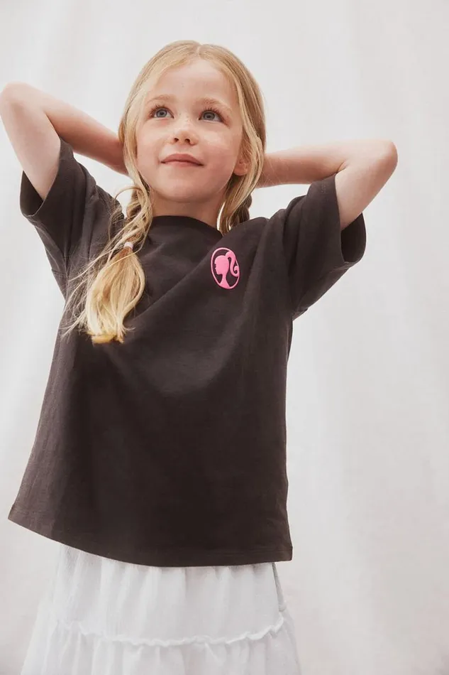 License Drop Shoulder Short Sleeve Tee Lcn Mat Barbie Dream Housephantom Girls Cotton On Tops and TShirts License Drop Shoulder Short Sleeve Tee Lcn Mat Barbie Dream Housephantom Girls Cotton On Tops and TShirts