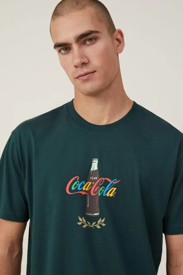 Loose Fit Pop Culture TShirt Lcn Cok Pine Needle Green Team Bottle Men Cotton On Tees and Tanks