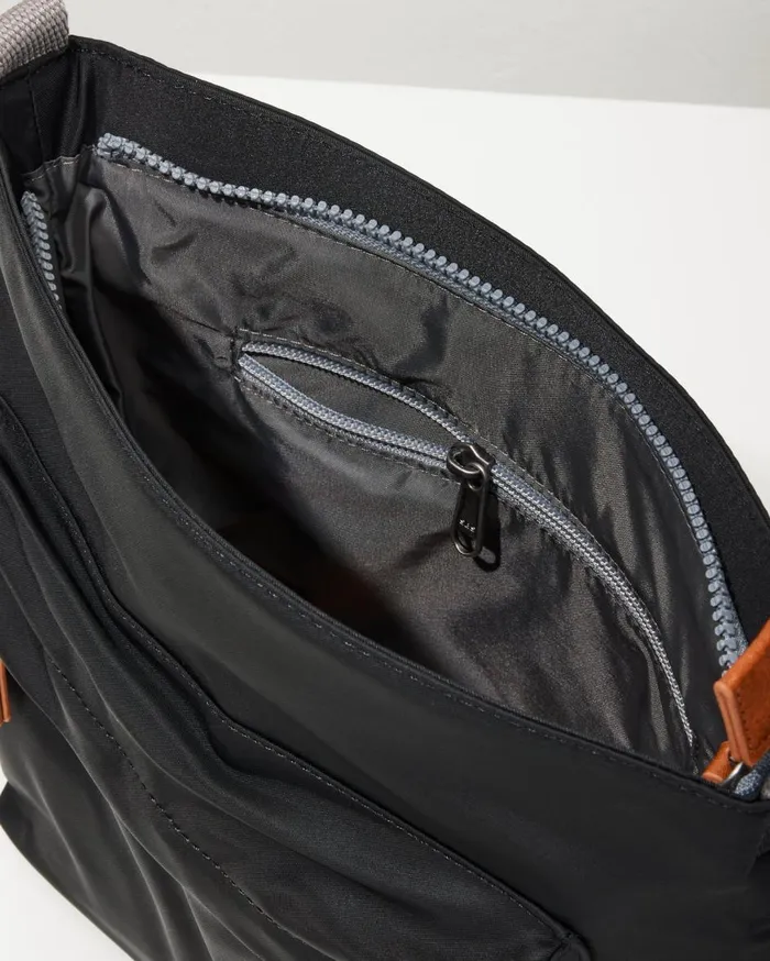 Tommy Bahama Kennington Black Crossbody Black WomenMenBig and TallBeach and Home Handbags and Clutches Tommy Bahama Kennington Black Crossbody Black WomenMenBig and TallBeach and Home Handbags and Clutches